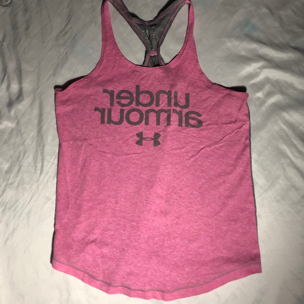 Under Armour pink and grey kids workout tee.